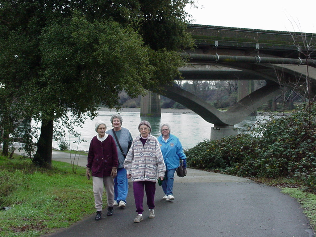 group of senior woman going for a walk